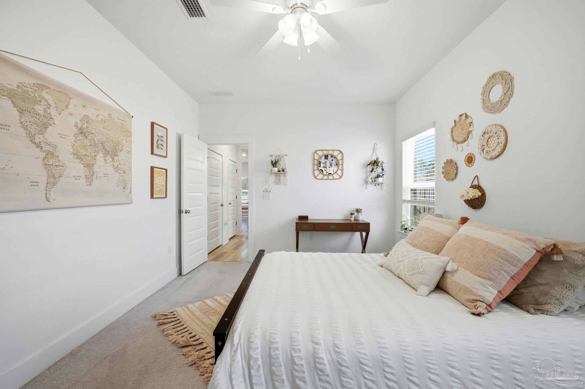 6228 Dry Crk Road Molino, FL 32577 - Photo 48 of 64 a bedroom with a bed and a window