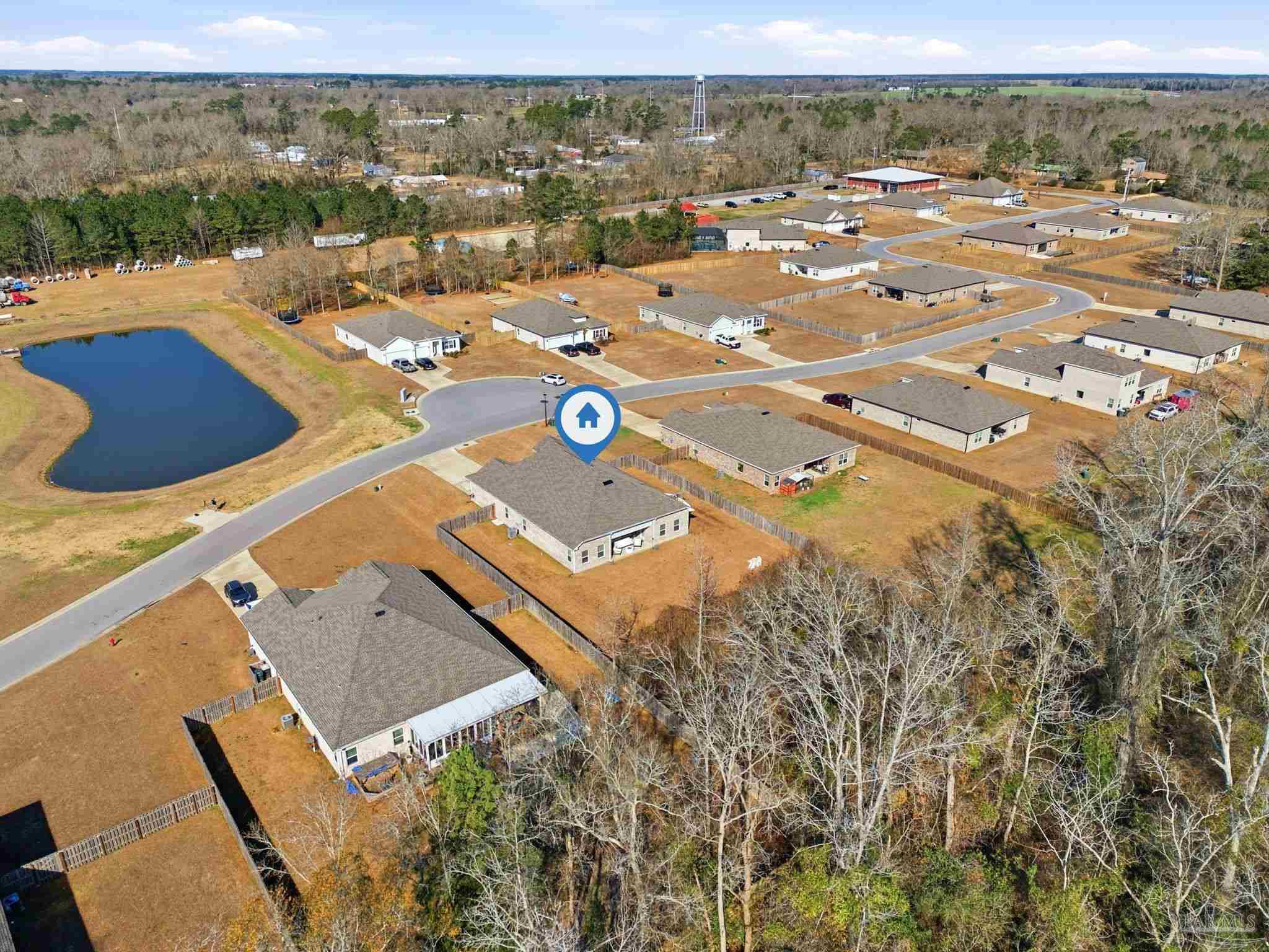 6228 Dry Crk Road Molino, FL 32577 - Photo 57 of 64 an aerial view of residential houses with outdoor space