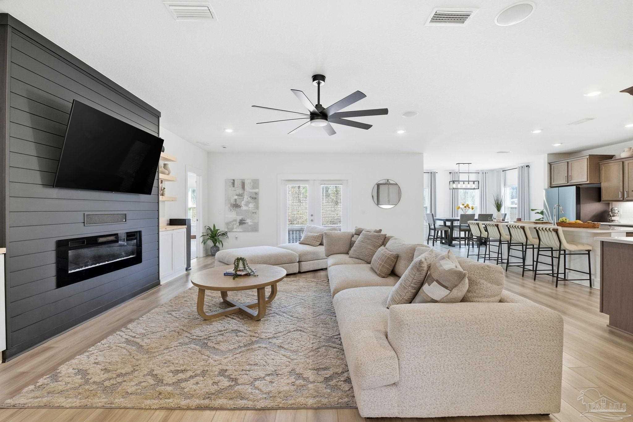 6228 Dry Crk Road Molino, FL 32577 - Photo 7 of 64 a living room with fireplace furniture and a flat screen tv