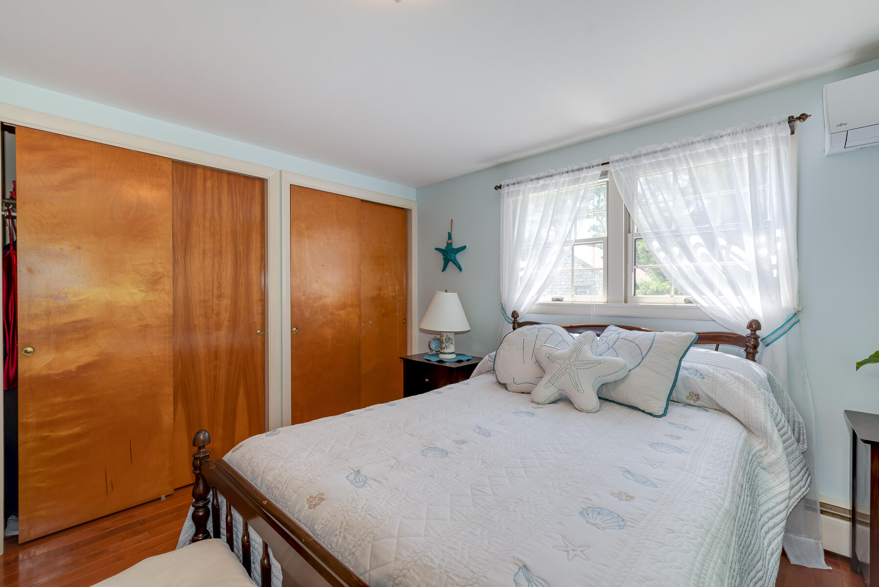 129 Bacon Road Hyannis, MA 02601 - Photo 16 of 43 a bedroom with a bed and a window