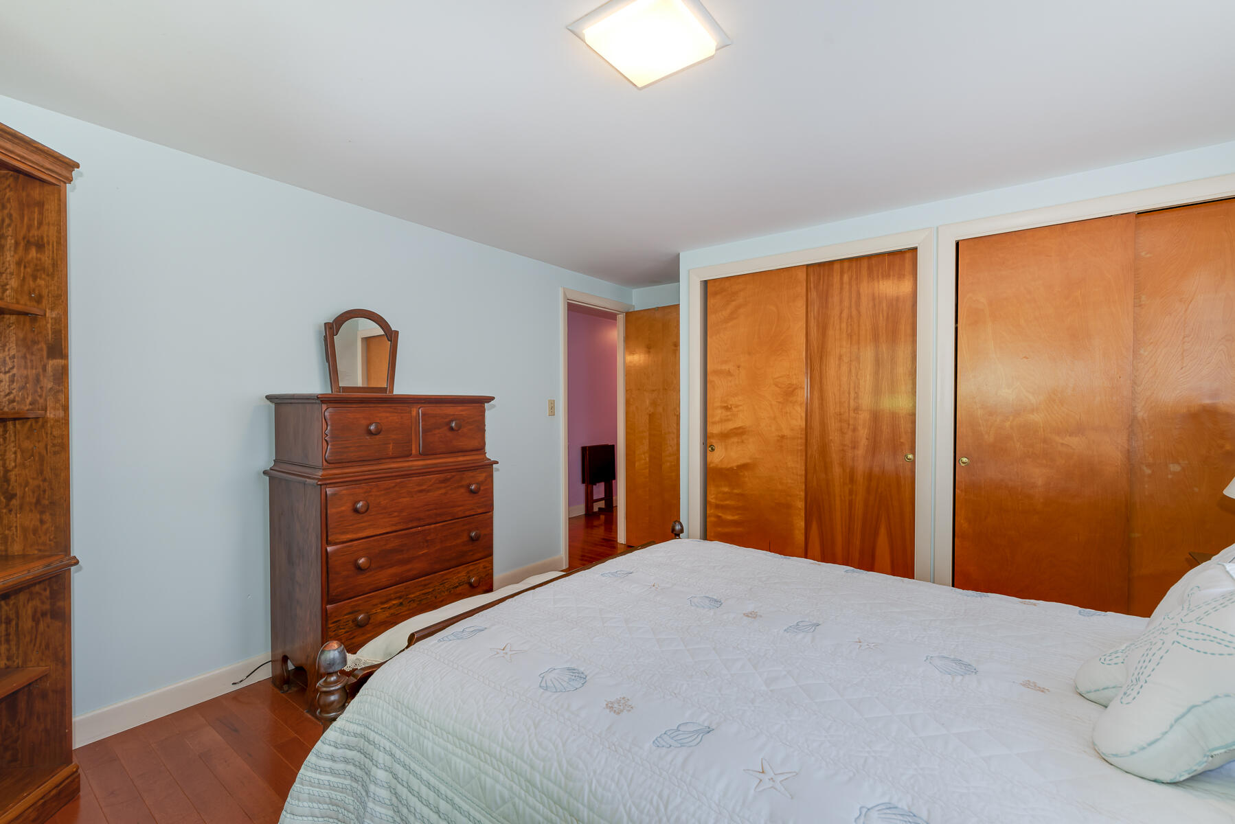 129 Bacon Road Hyannis, MA 02601 - Photo 17 of 43 a bedroom with a bed and a dresser