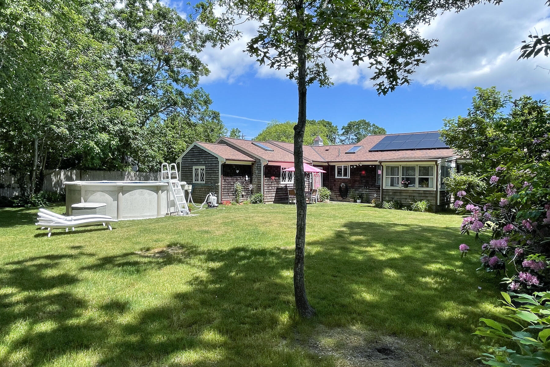 129 Bacon Road Hyannis, MA 02601 - Photo 41 of 43 a view of a house with a yard