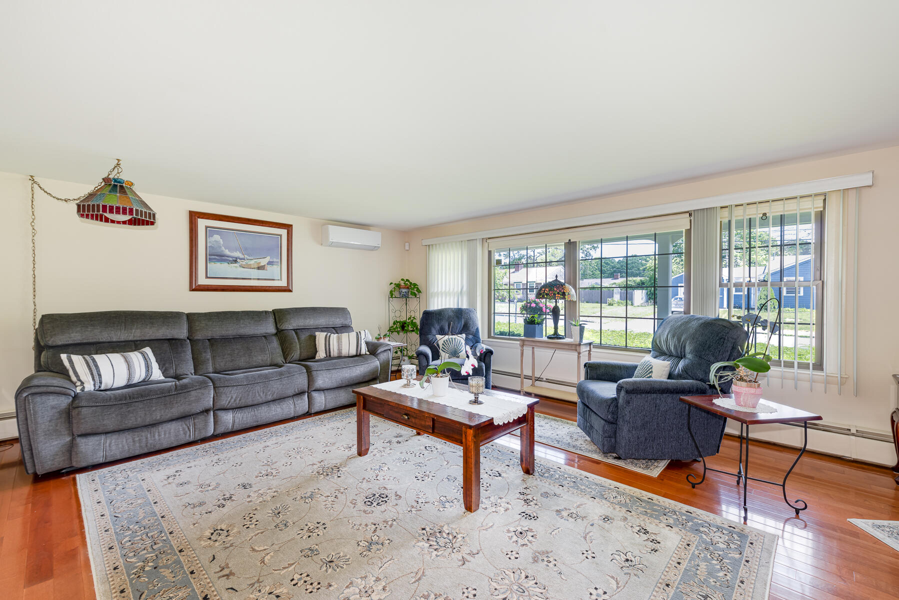 129 Bacon Road Hyannis, MA 02601 - Photo 5 of 43 a living room with furniture and a large window