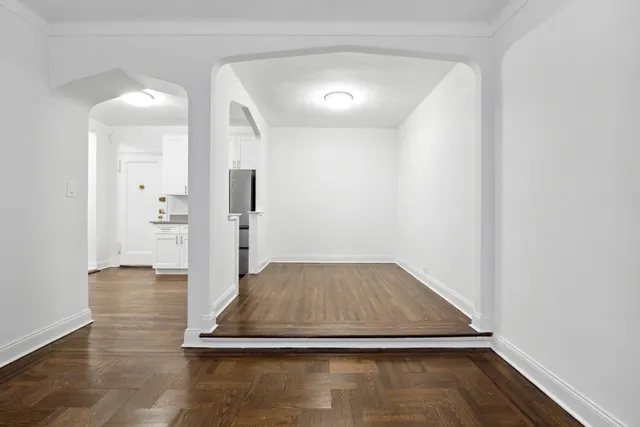 wooden floor in a hall with an entryway