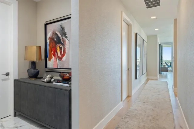 a view of a hallway with workspace