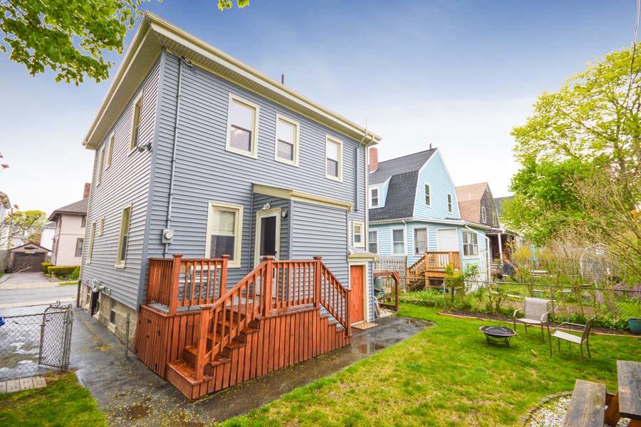 156 Rounds Street New Bedford, MA 02740 - Photo 24 of 24 a view of a house with backyard and porch
