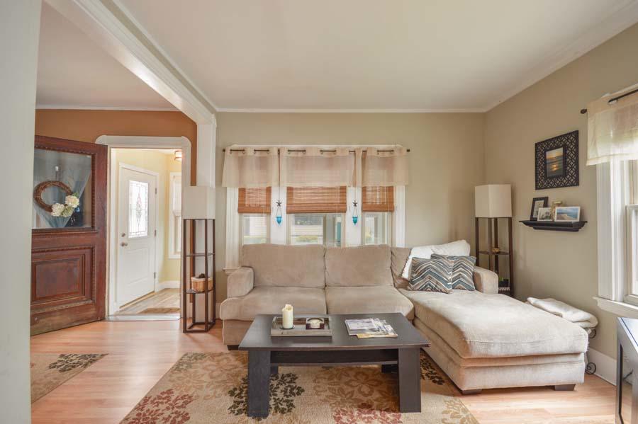 156 Rounds Street New Bedford, MA 02740 - Photo 7 of 24 a living room with furniture and a large window