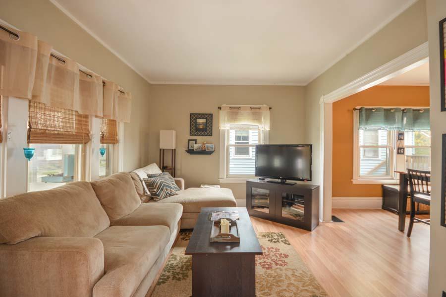 156 Rounds Street New Bedford, MA 02740 - Photo 8 of 24 a living room with furniture and a flat screen tv
