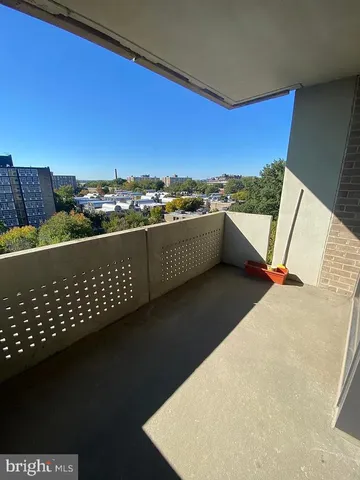 a view of balcony with furniture