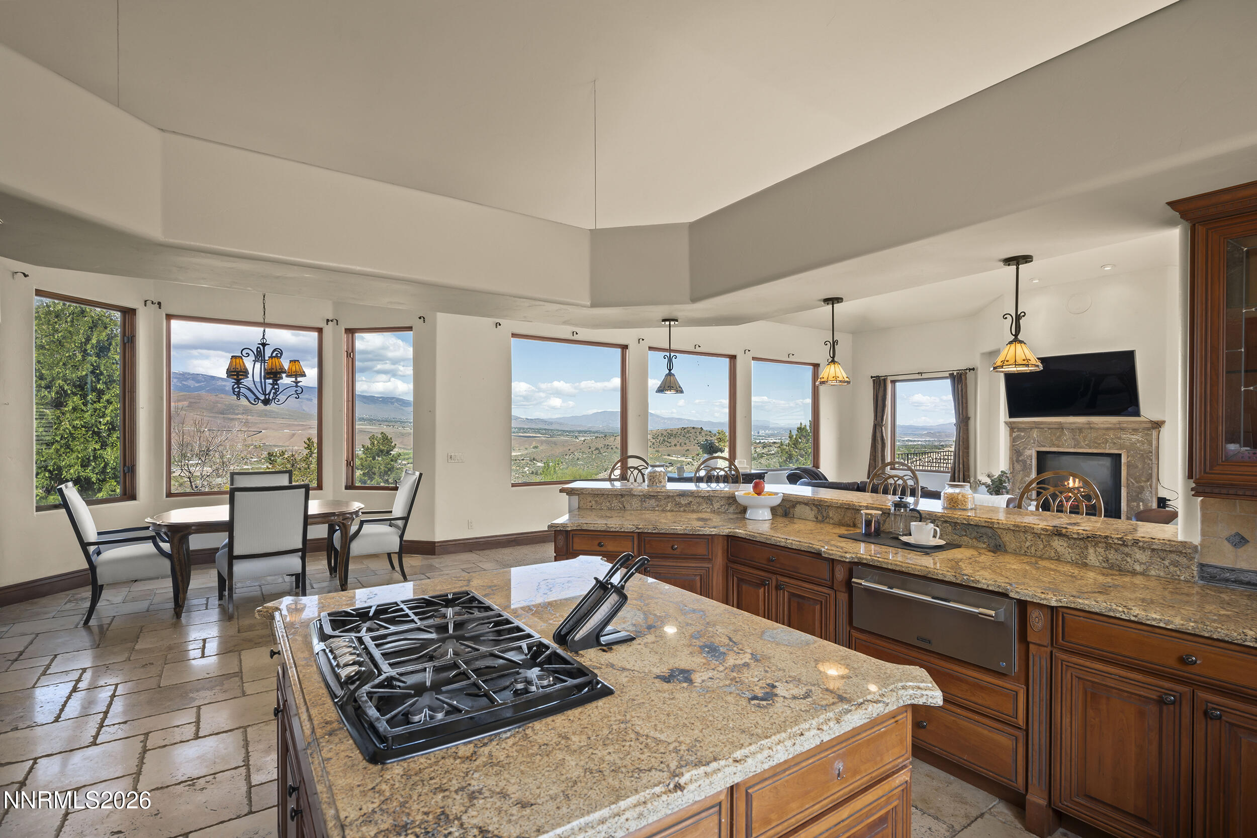 17300 Majestic View Drive Reno, NV 89521 - Photo 19 of 52 a kitchen with a stove a sink and a wooden cabinets