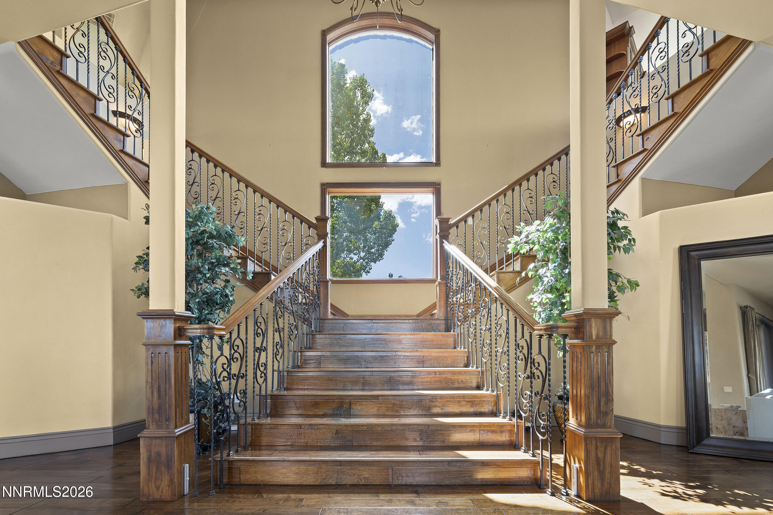 17300 Majestic View Drive Reno, NV 89521 - Photo 6 of 52 a view of staircase with wooden floor and a large window