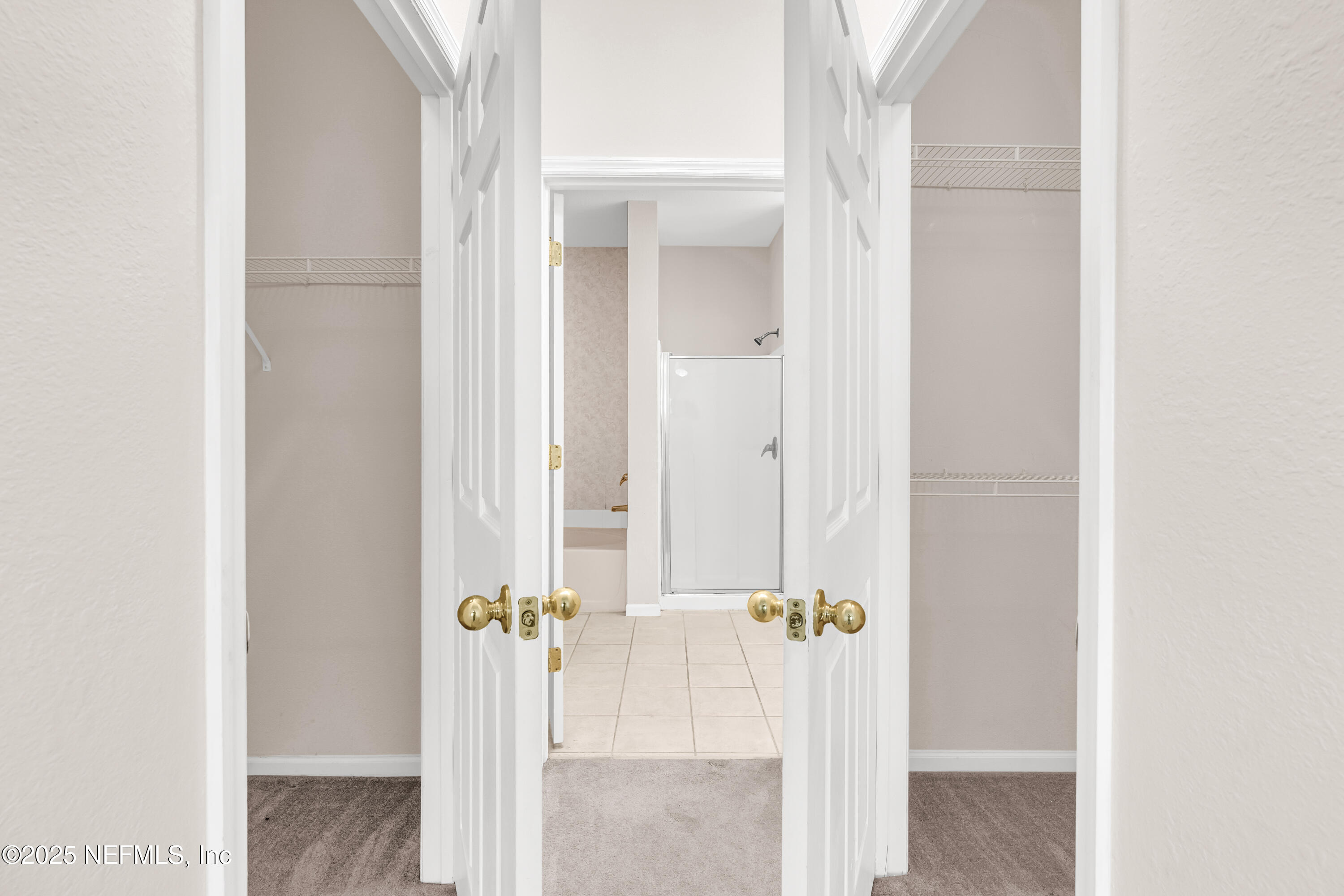 10901 Burnt Mill Road, Unit 307 Jacksonville, FL 32256 - Photo 14 of 28 master closets