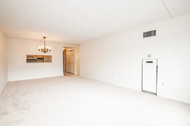 a view of a room with a window