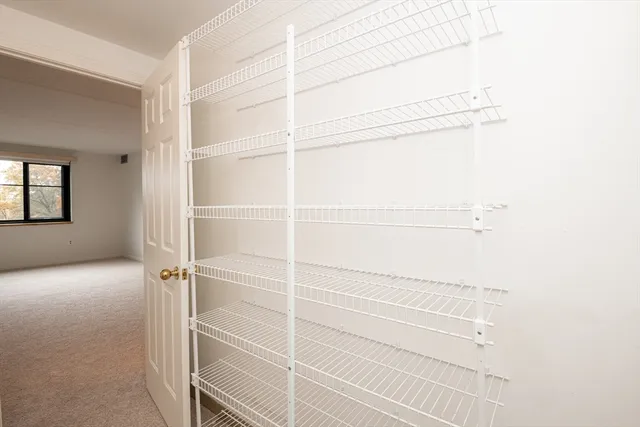 a bathroom with a sink and a washer dryer
