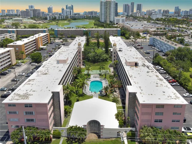 aerial view of a house with a lake view