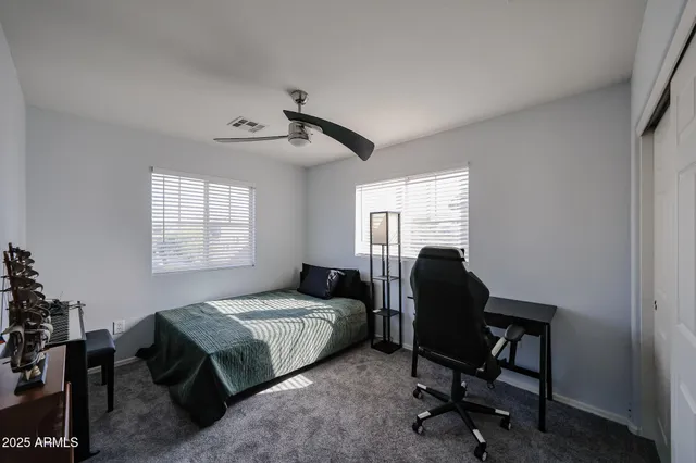 a view of a swimming pool and lounge chair