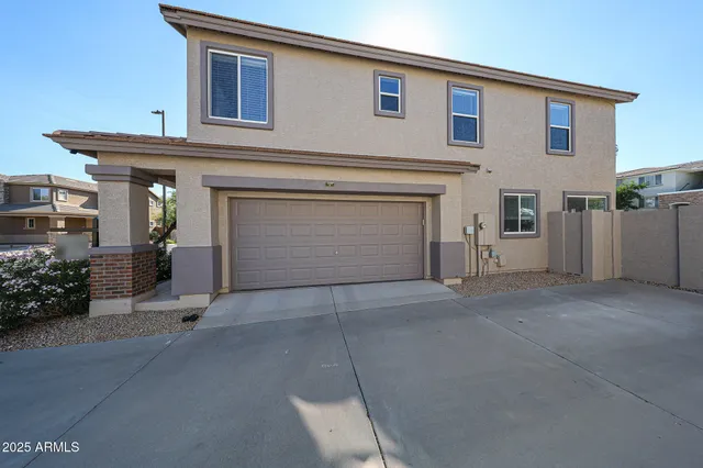 a view of a house with a garage