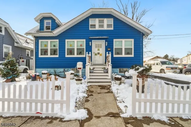 a front view of a house with a porch