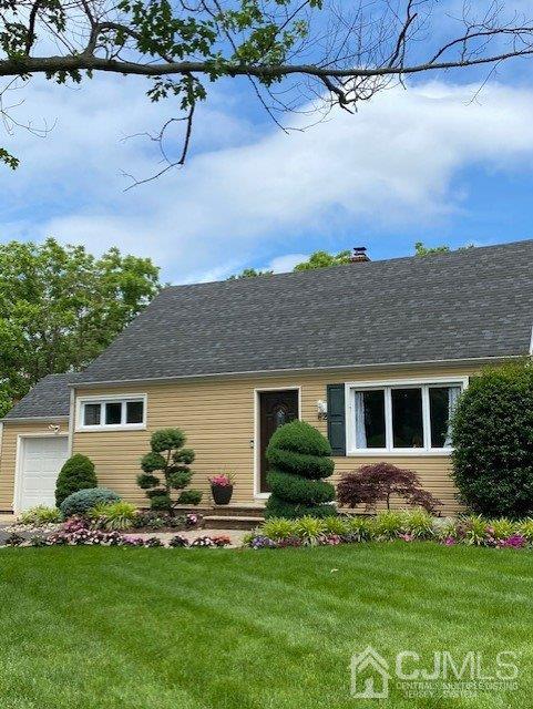 62 Tunison Road New Brunswick, NJ 08901 - Photo 1 of 23 a view of a house with a yard