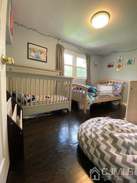 62 Tunison Road New Brunswick, NJ 08901 - Photo 15 of 23 a bed room with furniture and window