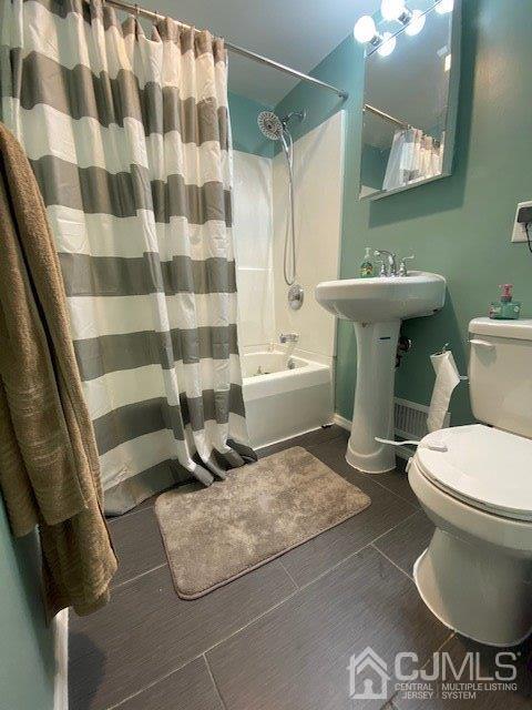 62 Tunison Road New Brunswick, NJ 08901 - Photo 16 of 23 a bathroom with a sink toilet and shower