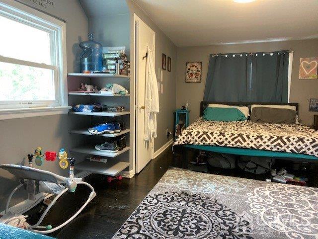 62 Tunison Road New Brunswick, NJ 08901 - Photo 17 of 23 a bedroom with a bed and a window