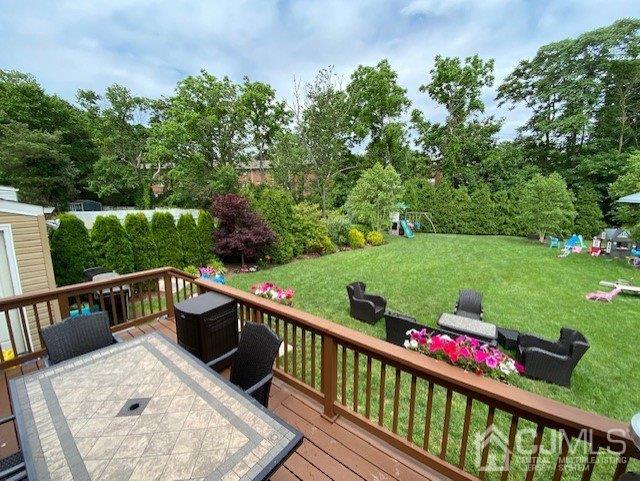 62 Tunison Road New Brunswick, NJ 08901 - Photo 20 of 23 a view of a two chairs and table in the balcony