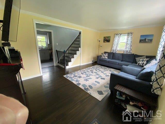 62 Tunison Road New Brunswick, NJ 08901 - Photo 4 of 23 a living room with furniture and a window