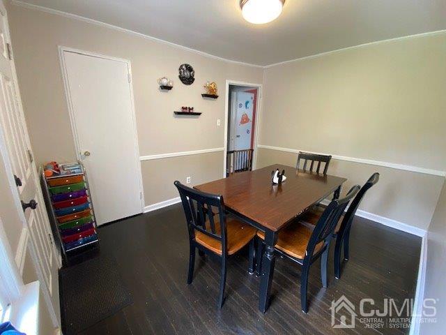 62 Tunison Road New Brunswick, NJ 08901 - Photo 9 of 23 a view of a dining room with furniture and wooden floor