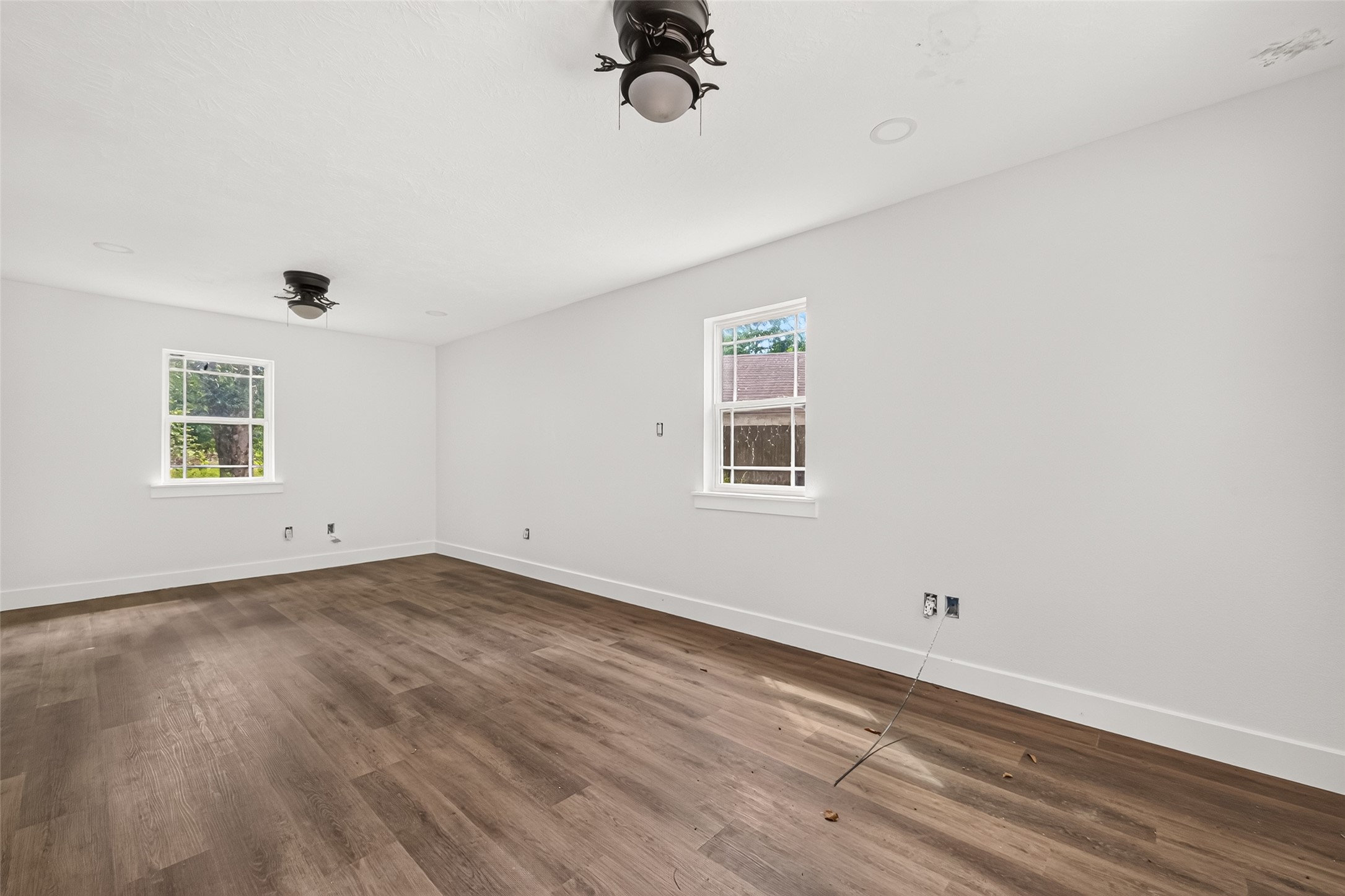 6222 Farm To Market 1010 Road Cleveland, TX 77327 - Photo 21 of 34 Spacious bedroom with ceiling fan and natural light