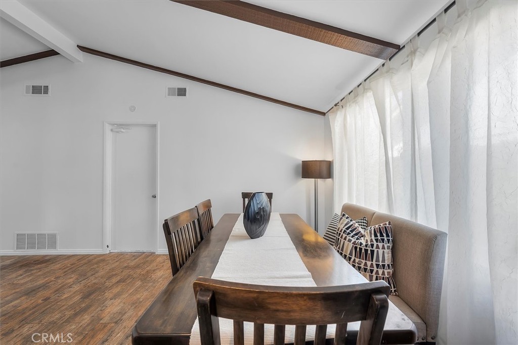 1702 East Dimondale Drive Carson, CA 90746 - Photo 18 of 43 a view of a dining room with furniture and wooden floor