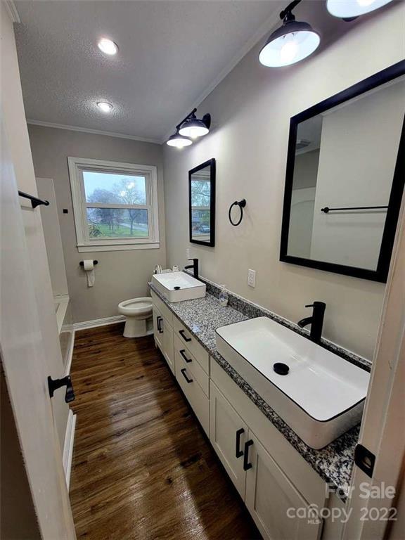 806 Ike Lynch Road Dallas, NC 28034 - Photo 13 of 24 a bathroom with a sink and mirror