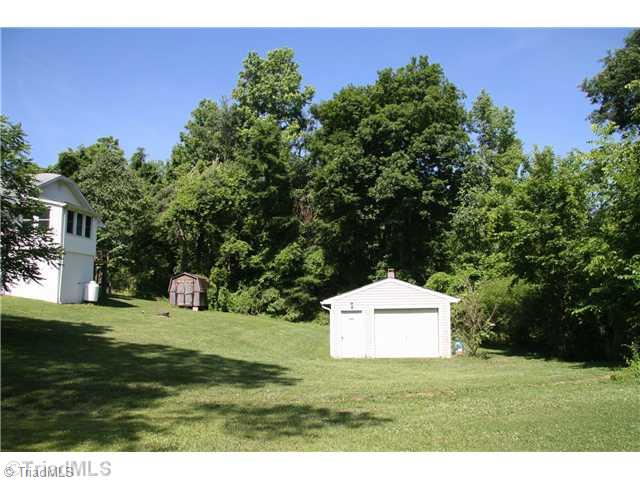 1421 Ritters Lake Road Greensboro, NC 27406 - Photo 14 of 16 Yard/Garden. Yard, Garage & Storage