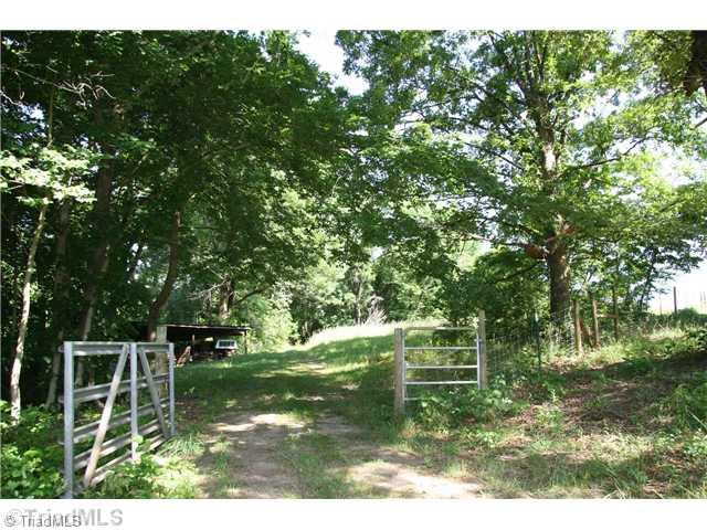 1421 Ritters Lake Road Greensboro, NC 27406 - Photo 16 of 16 Yard/Garden. Fenced Pasture