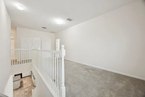 a view of a livingroom with entryway