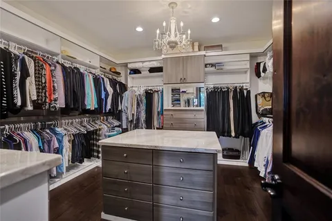 a kitchen with stainless steel appliances a refrigerator and a stove