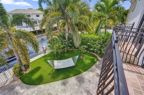 a bathroom with a bathtub and window