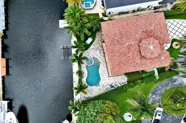 an aerial view of a house with garden