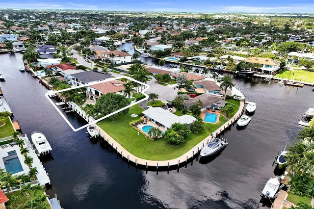 a view of a swimming pool with chairs