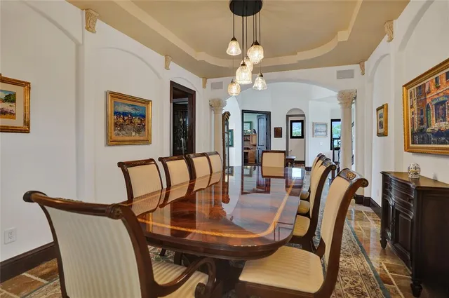 a view of a dining room with furniture