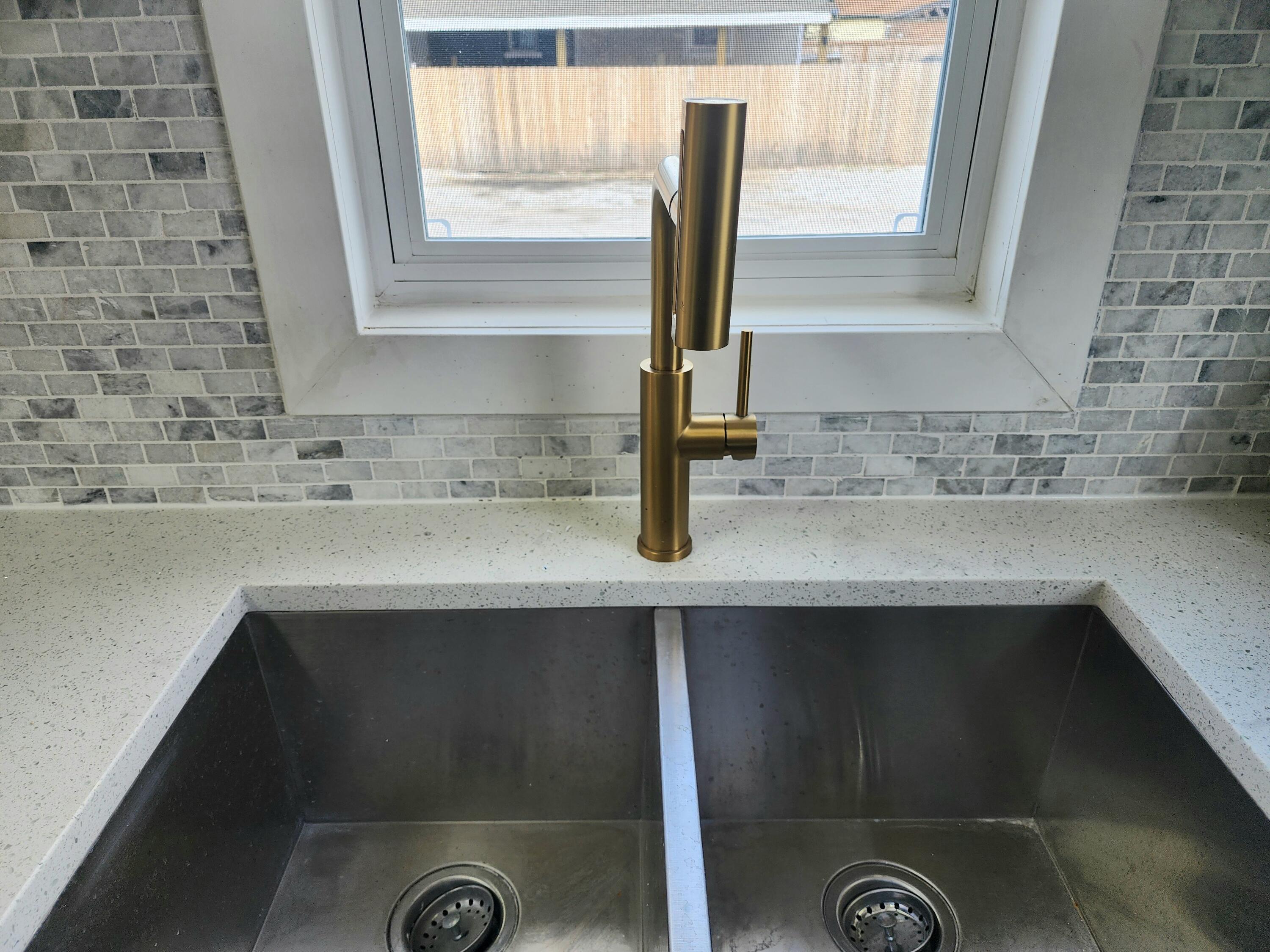 601 Burr Street Gary, IN 46406 - Photo 11 of 24 a kitchen with a sink and a window