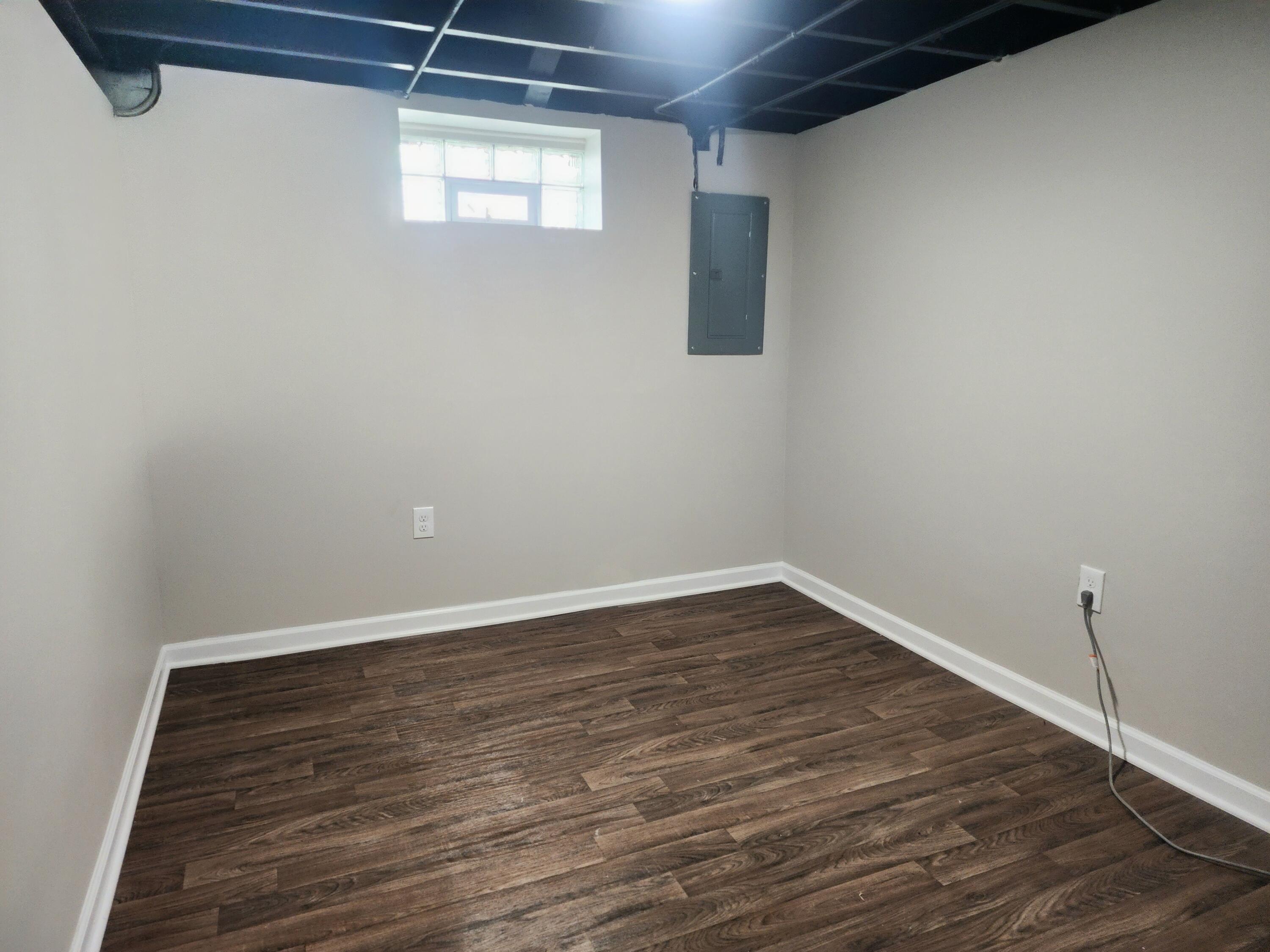 601 Burr Street Gary, IN 46406 - Photo 17 of 24 a view of wooden floor and windows in a room