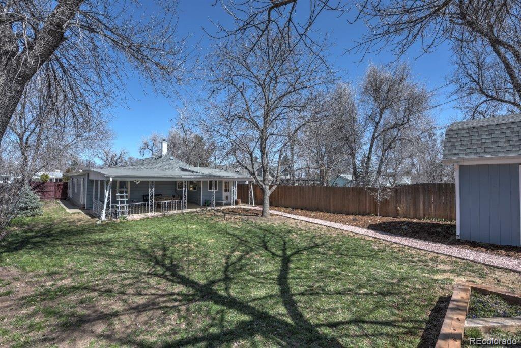 508 East Baseline Road Lafayette, CO 80026 - Photo 18 of 35 a front view of house with yard and trees around