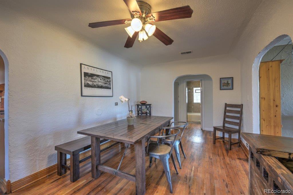 508 East Baseline Road Lafayette, CO 80026 - Photo 6 of 35 a view of a dining room with furniture and wooden floor