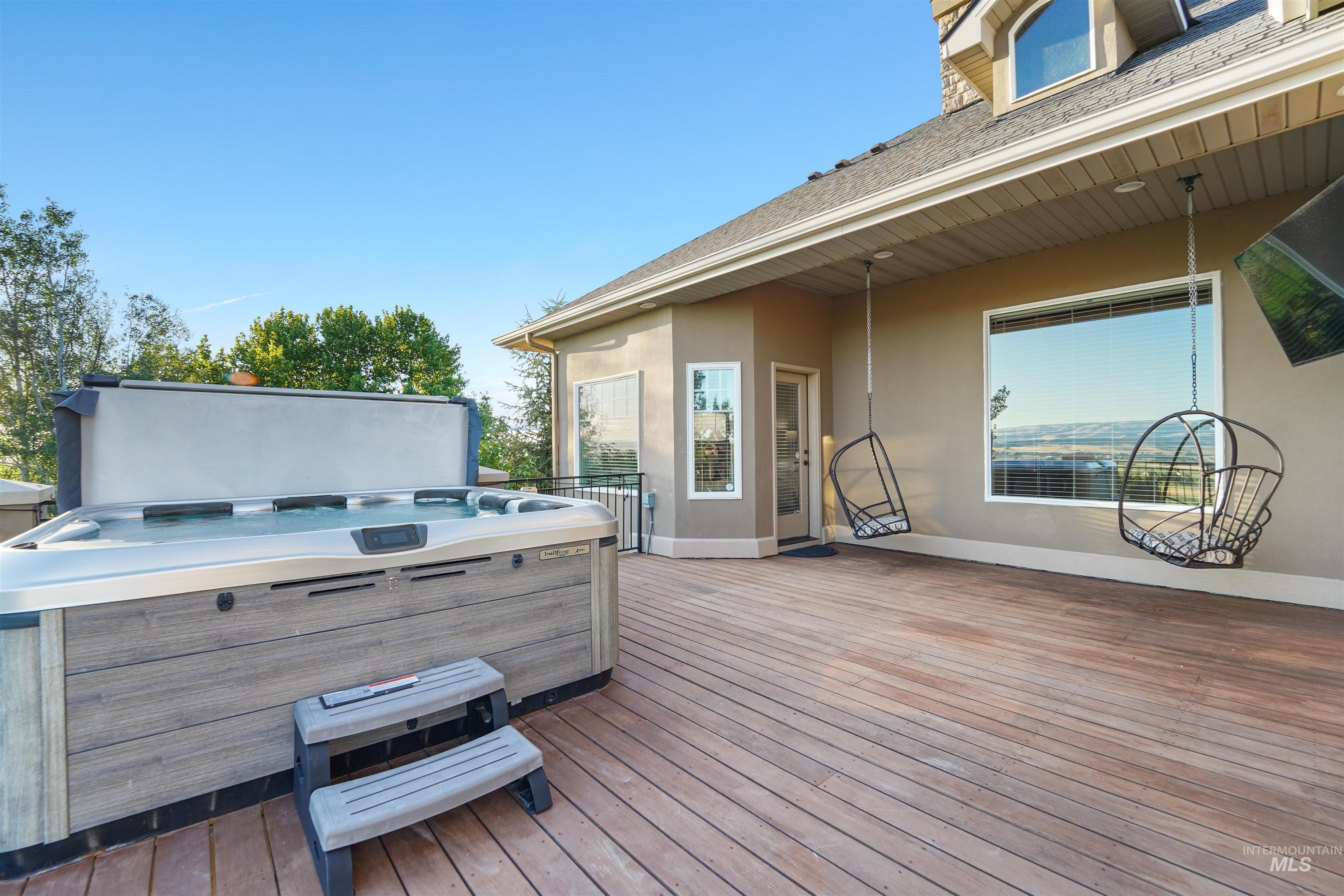 10430 Randall Lane Caldwell, ID 83607 - Photo 29 of 39 Wooden terrace with a hot tub