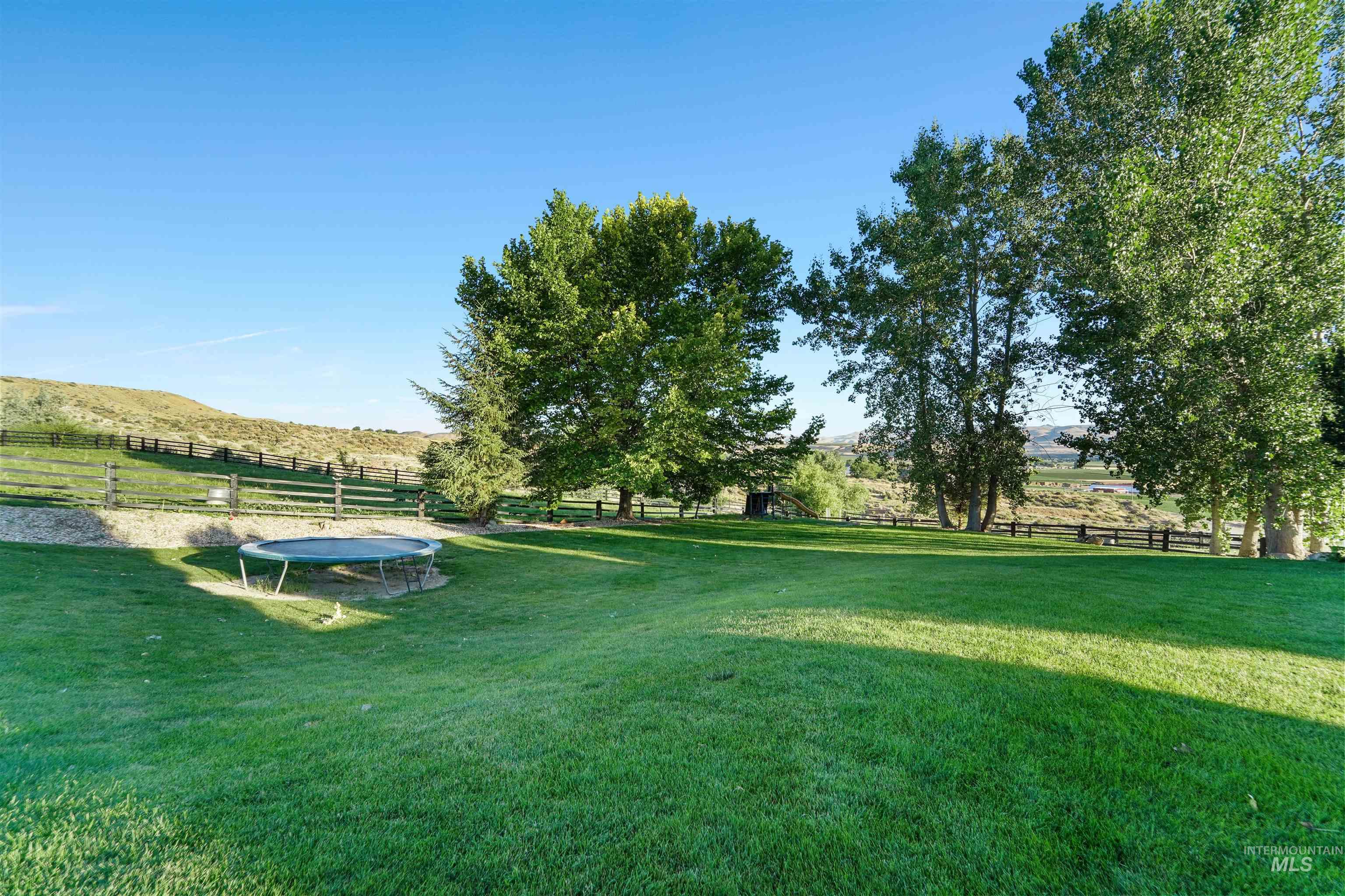 10430 Randall Lane Caldwell, ID 83607 - Photo 30 of 39 View of yard featuring a trampoline