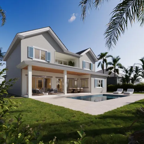 a front view of a house with a yard table and chairs