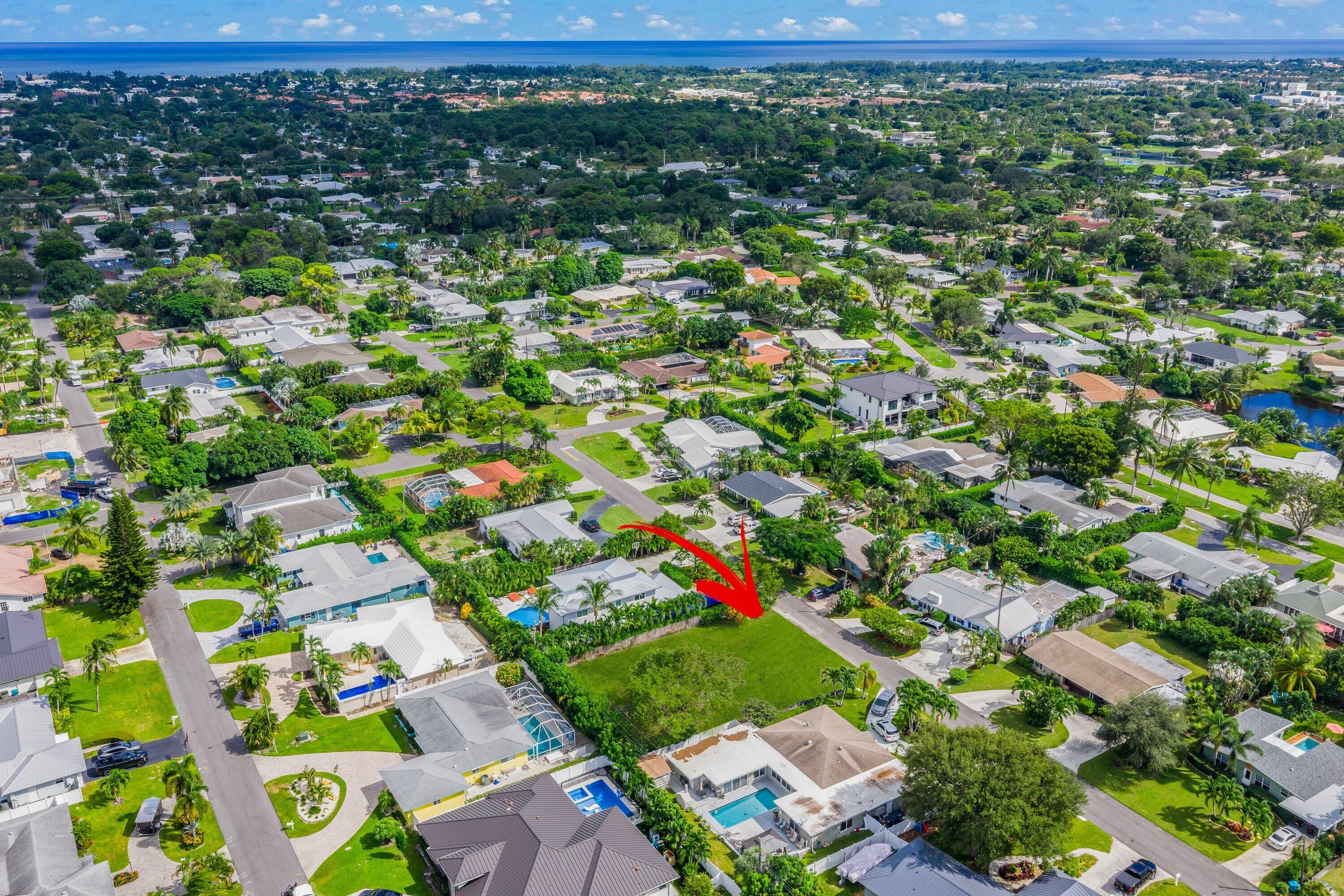 925 Sunset Road Boynton Beach, FL 33435 - Photo 2 of 16 an aerial view of residential houses with outdoor space