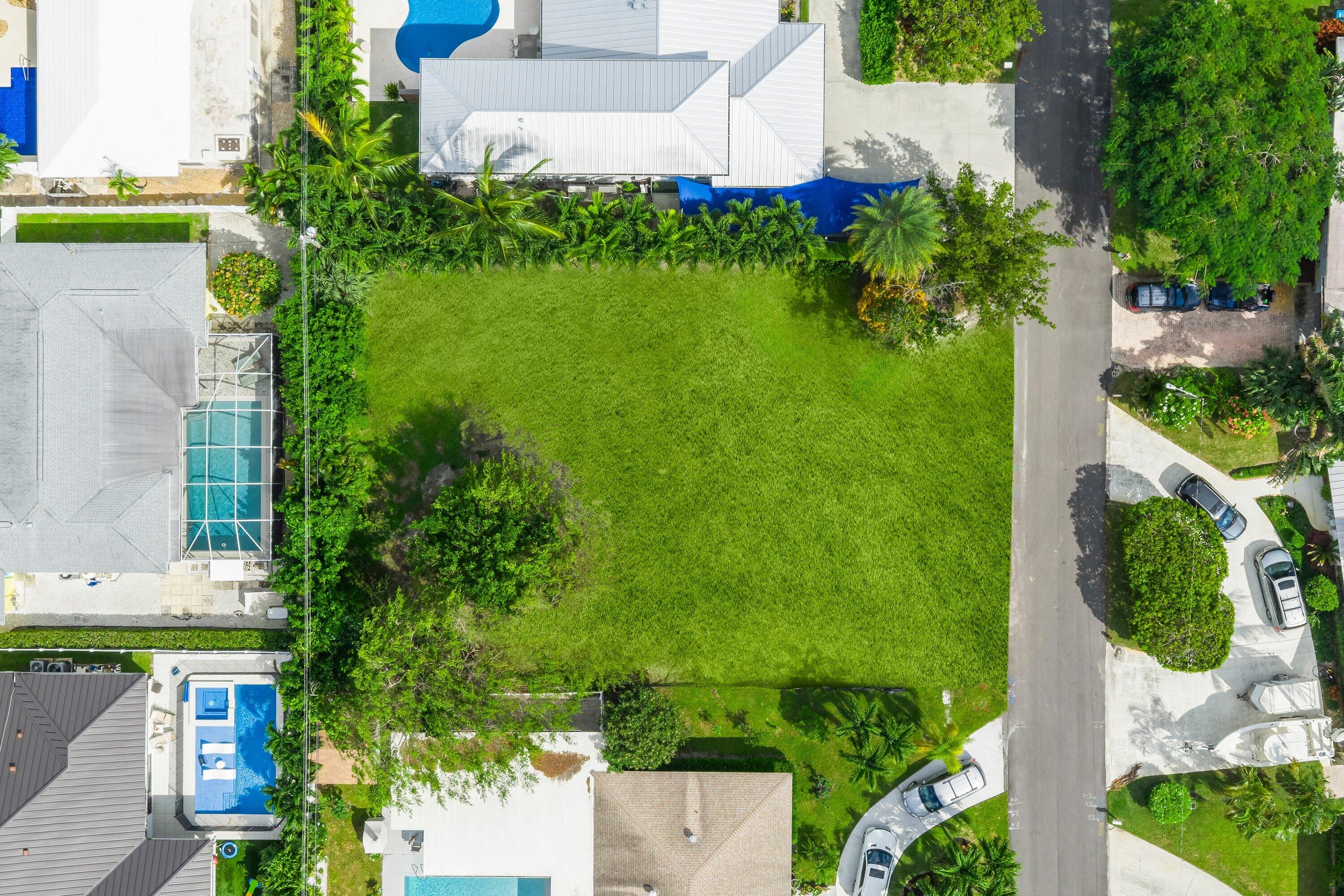 925 Sunset Road Boynton Beach, FL 33435 - Photo 5 of 16 an aerial view of a house with a yard
