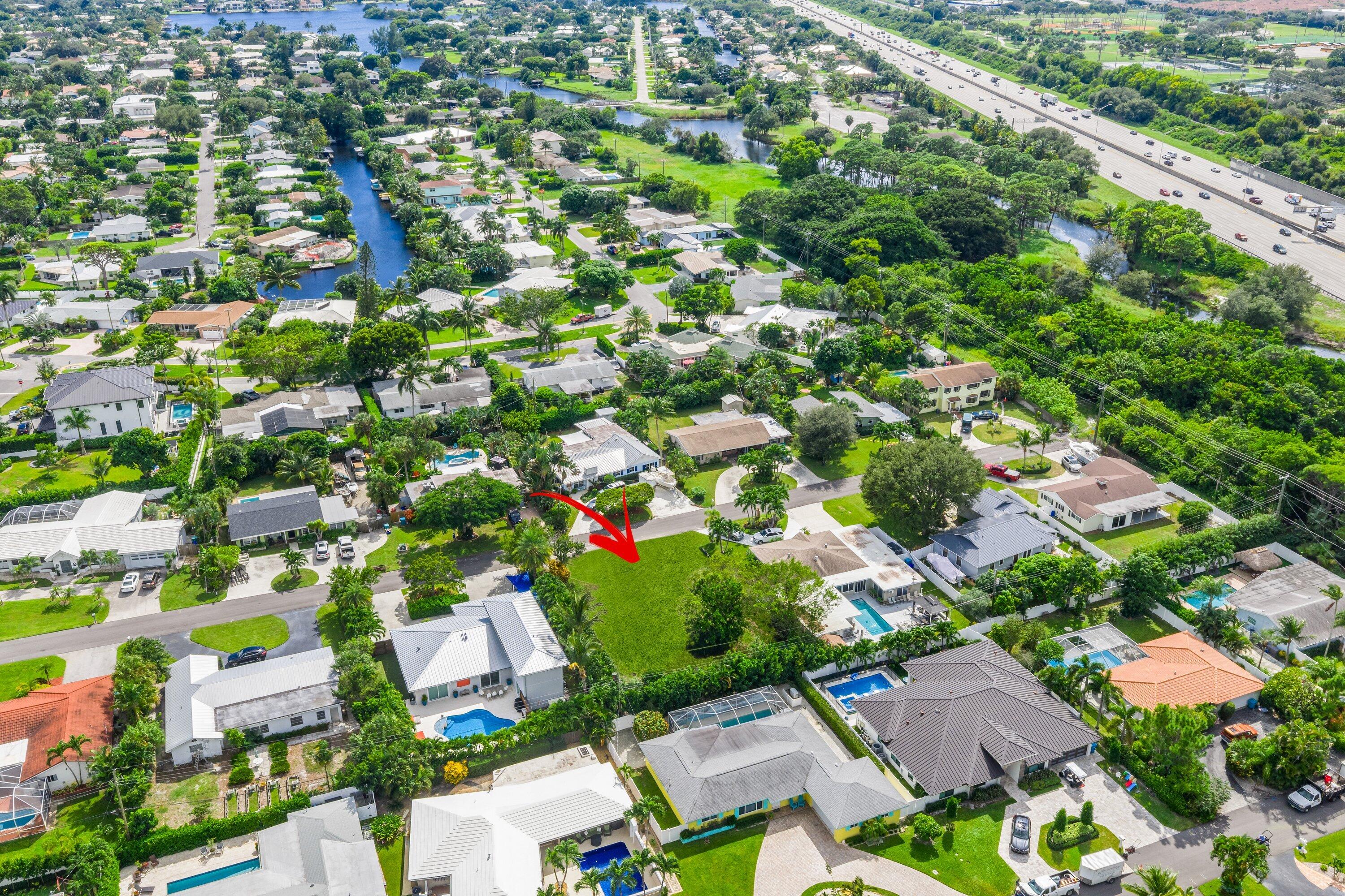 925 Sunset Road Boynton Beach, FL 33435 - Photo 10 of 16 an aerial view of residential houses with outdoor space and street view